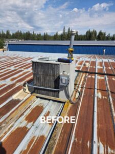 An old rooftop HVAC unit before replacement by Maddog Contracting LLC in Post Falls, ID.