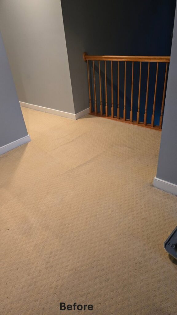 A before photo of a beige carpeted hallway and landing, ready for work by Footprints Floors of Northern Virginia in Alexandria, VA.