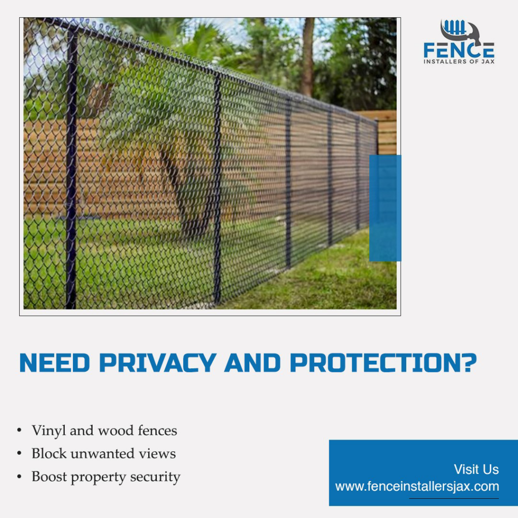 A black chain link fence providing security by Fence Installers of Jacksonville in Jacksonville, FL.