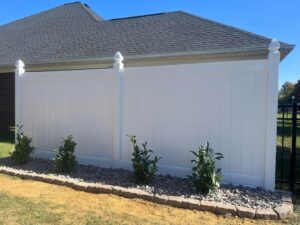 Black metal fence installed along a pond by Rager Fencing & Lawn Care, LLC in Owensboro, KY.