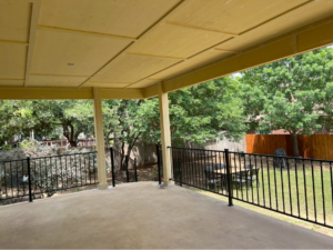 Newly installed black metal patio railings, a custom fabrication service by Down South Welding and Fabrication in Canyon Lake, TX.