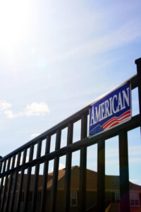 A black metal security fence installed by American Fence Company of Columbus in Grand Island, NE.