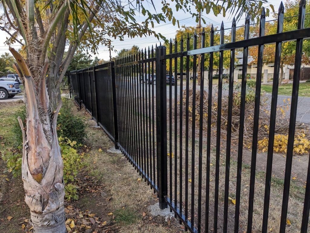 A black ornamental iron fence installed by Sacramento Valley Fencing in Sacramento, CA.