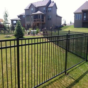 A stylish black ornamental iron fence installed by White Eagle Fence Inc in New Haven, CT.