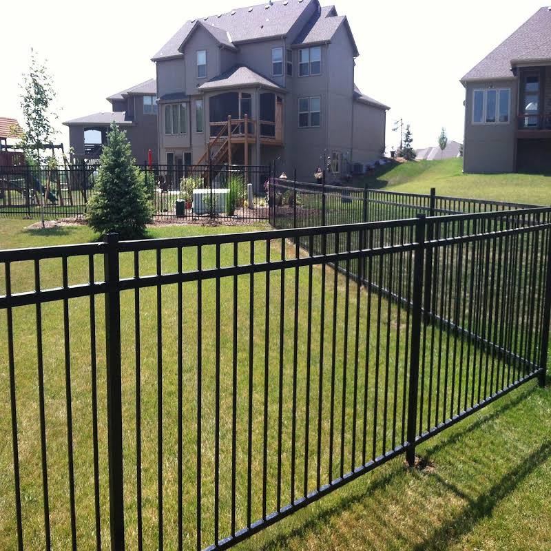 A stylish black ornamental iron fence installed by White Eagle Fence Inc in New Haven, CT.