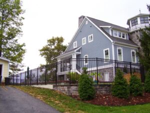 A black ornamental fence installed around a residential property by Raatz Fence Company in Louisville, KY.