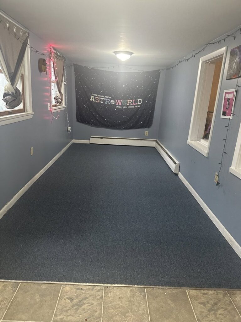 Blue carpet recently installed in a residential room by WCW Carpet Warehouse in Bennington, VT