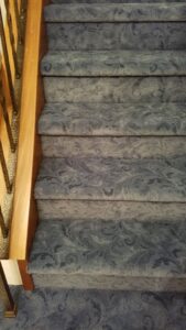 Newly installed blue patterned carpet on stairs by Floor Designs Unlimited, LLC in Pittsburgh, PA