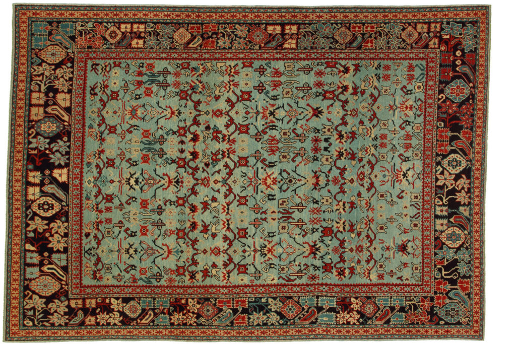 A stunning blue and red patterned carpet, showcasing the diverse offerings from Woven Legends in Philadelphia, PA.