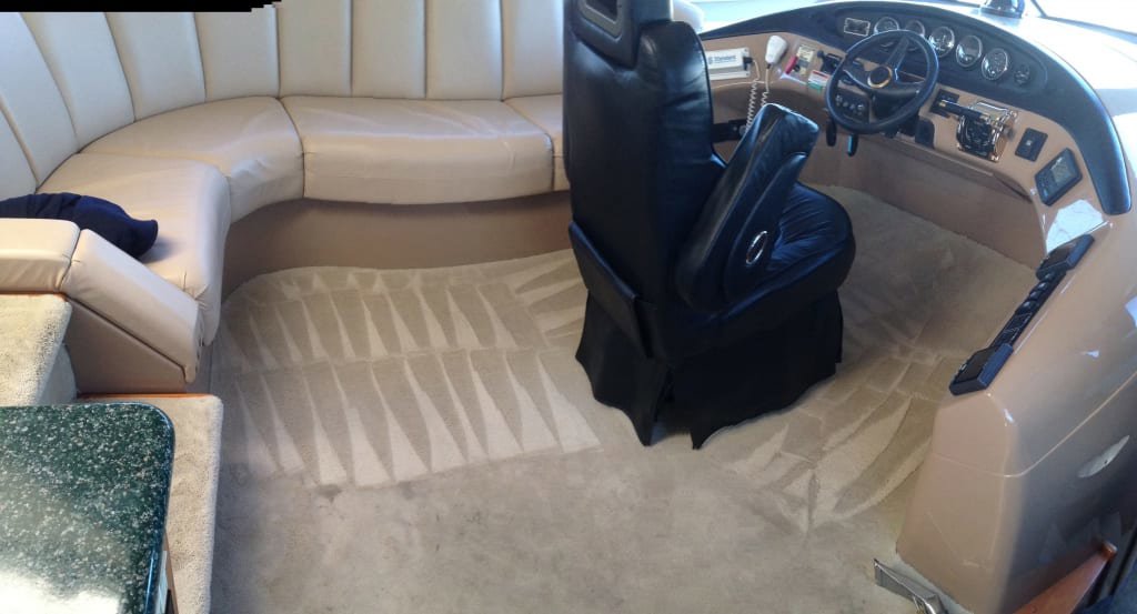 Carpet cleaning in progress inside a boat or yacht, showing cleaning lines by Tex A Clean Carpet Care in League City, TX.