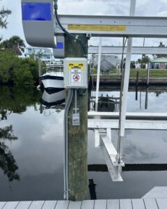A boat lift electrical control box installed by Sound Electric LLC in Saint James City, FL.
