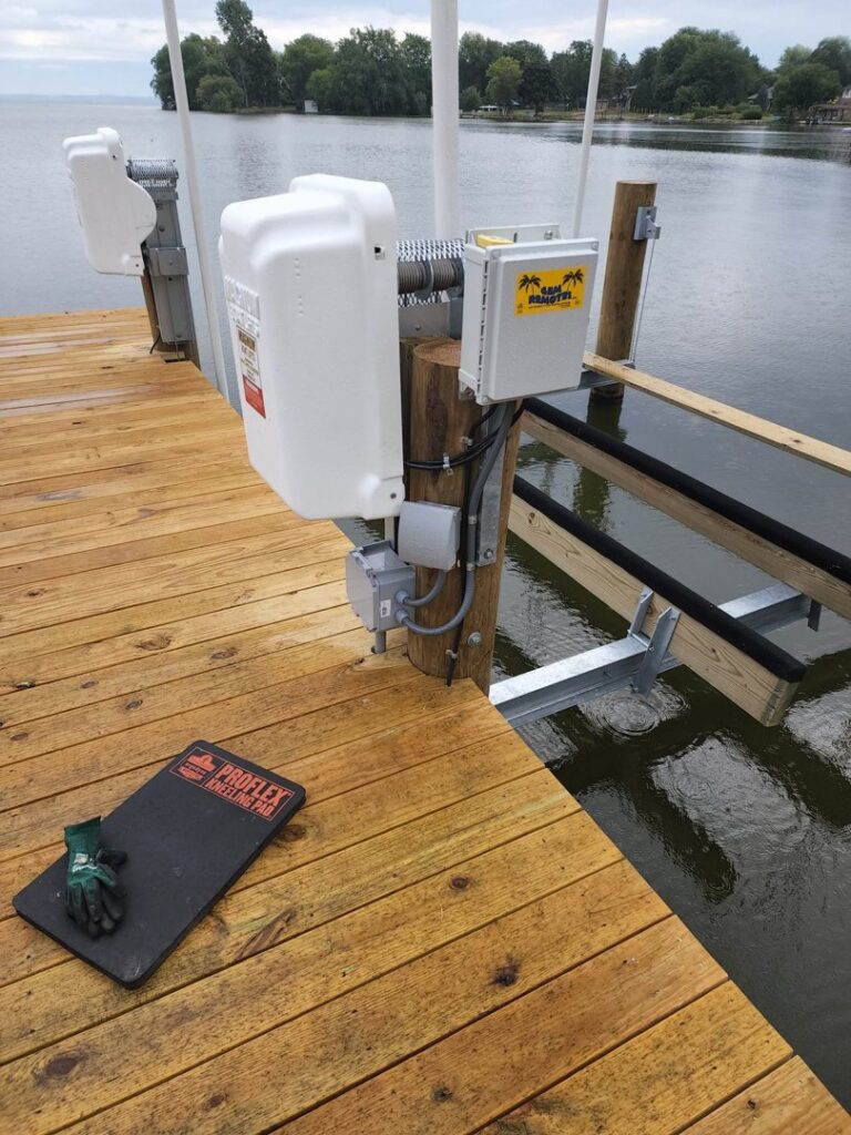 A complete boat lift electrical system installation, including control box and motor, by Apparent Electric LLC in Oshkosh, WI.