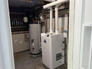A new boiler and water heater installation with copper piping by JLP Heating & Cooling in Norwalk, CT