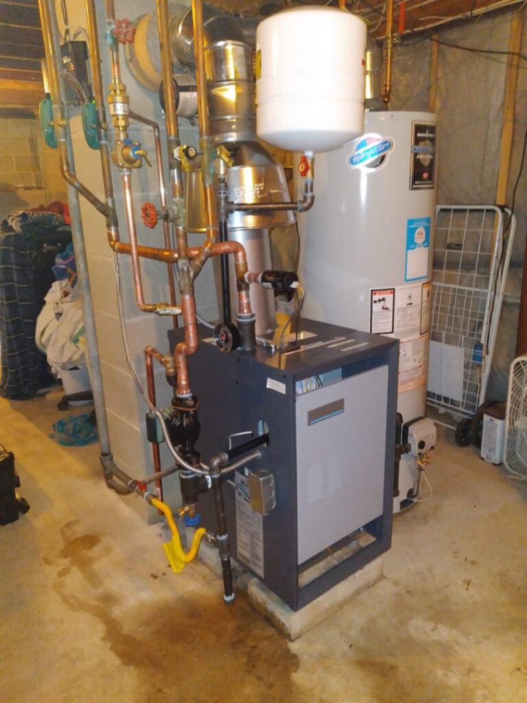 A newly installed boiler and furnace system with a water heater by Air We Are in Toms River, NJ.
