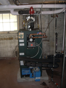 A boiler heating system installed in a basement by Collis Mechanical Services in Norfolk, VA