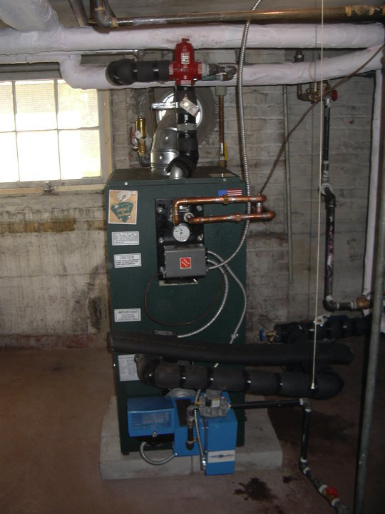 A boiler heating system installed in a basement by Collis Mechanical Services in Norfolk, VA