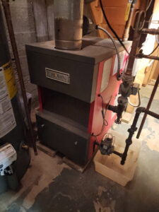 A boiler heating system installation with copper piping by Empire Heating & Air Conditioning in Decatur, GA