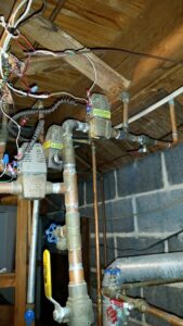 Copper pipes and valves for a boiler or heating system installation by American Team Inc in Warminster, PA