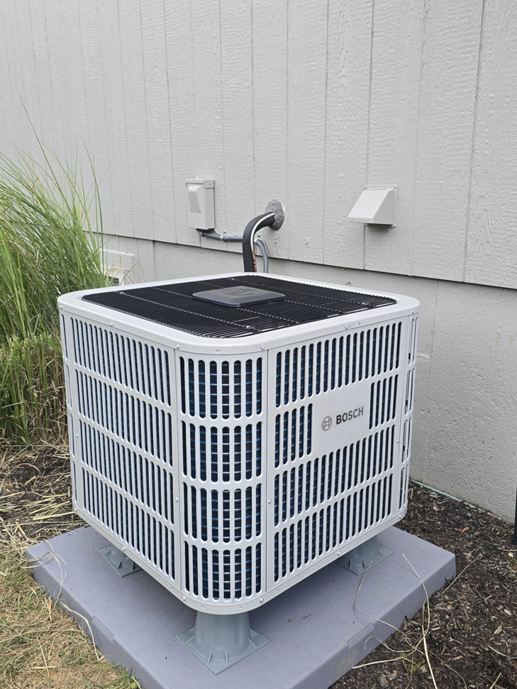 A new Bosch outdoor AC unit installation by Vega Heating and Cooling in Kansas City, KS