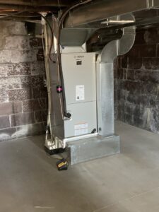 A new Bosch furnace and ductwork installation in a basement by Pacifico Heating and Cooling in Shadyside, OH.