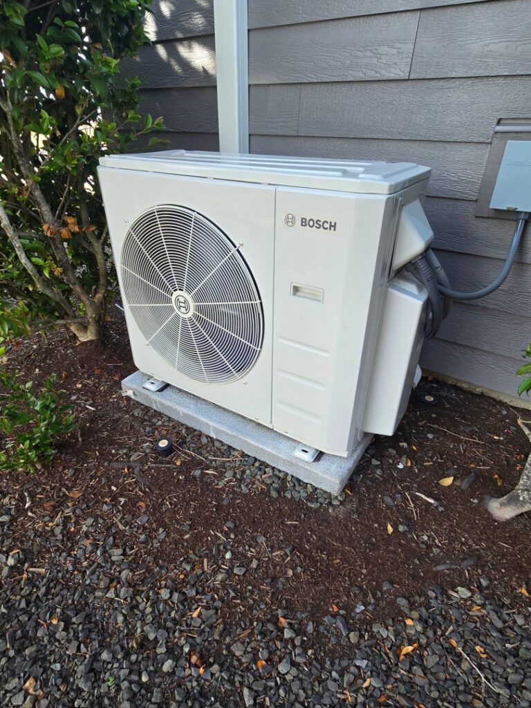 Outdoor Bosch heat pump condenser unit installed by HVAC Ministries LLC in Salem, OR