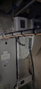 A Bosch HVAC air handler and Aprilaire air purifier installed with ductwork by Ultra Installs in Barrington, NH