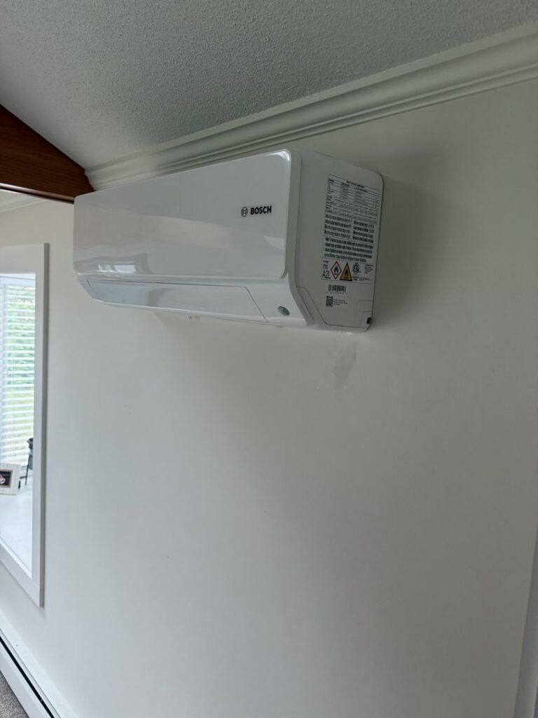 An indoor Bosch mini-split head unit mounted on a wall by Revolution HVAC in Owings Mills, MD.