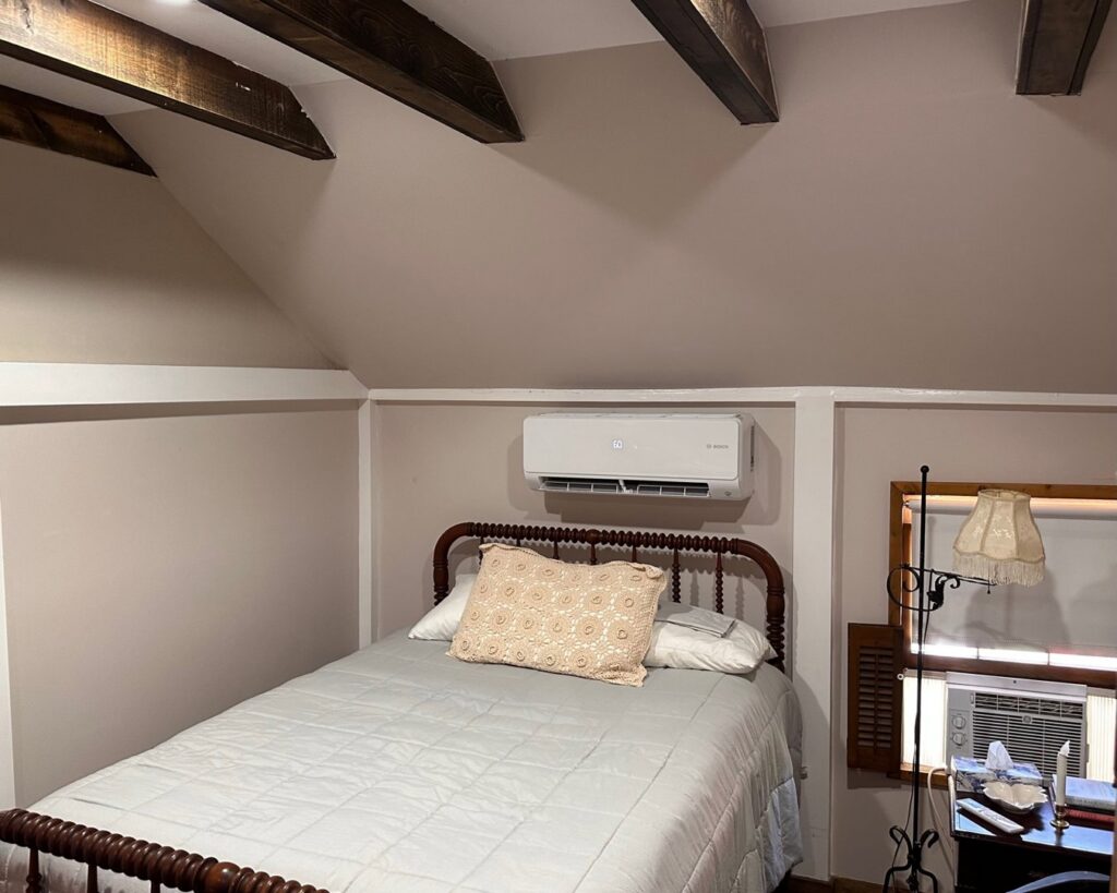 A Bosch mini-split indoor unit professionally installed in a bedroom by Integrity Aire in St. Charles, MO.