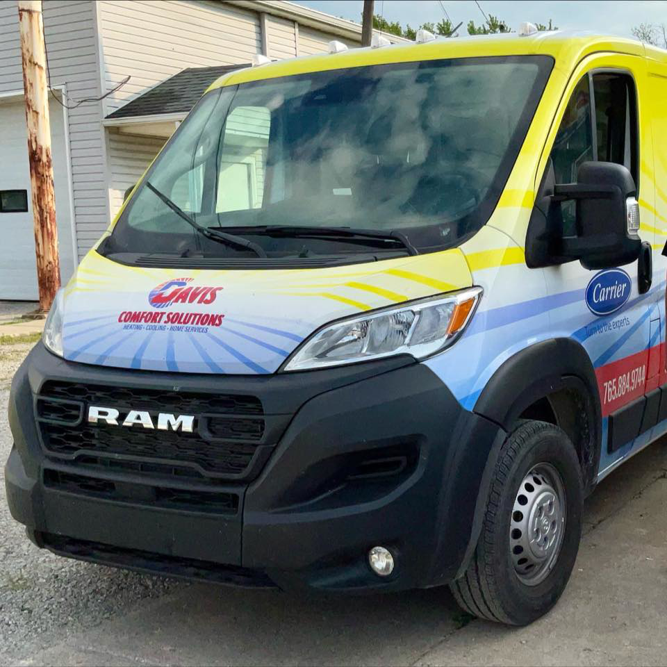 A branded service van for Davis Comfort Solutions-Heating & Cooling, ready for HVAC jobs in Fowler, IN