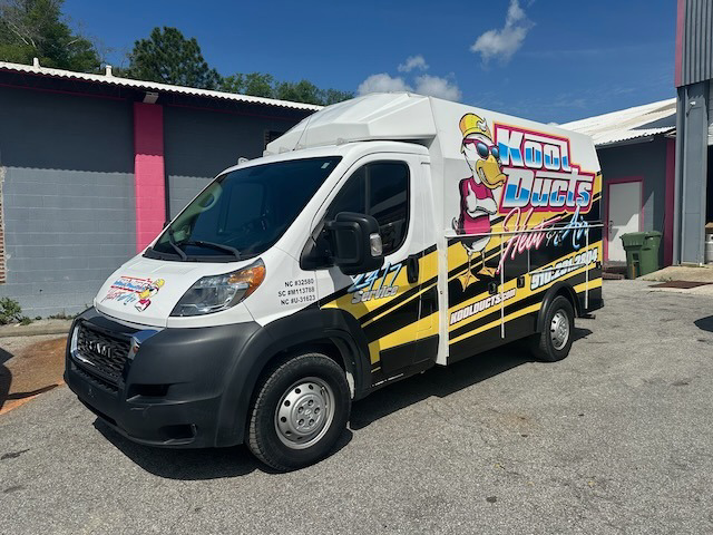 A branded service van for Kool Ducts Heat & Air, ready for HVAC jobs in Wilmington, NC.