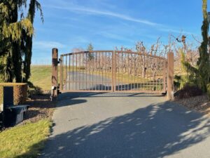 A brown ornamental driveway gate installed by Integrity Gates and Fencing in Yakima, WA