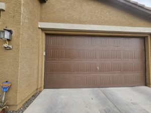 Brown panel garage door installation by Smokey's Garage Door Company in Glendale, AZ.
