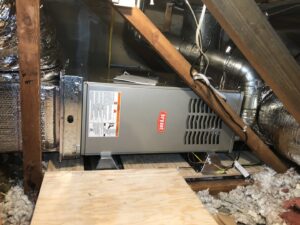 A Bryant furnace or air handler unit installed in an attic space by Peace & Comfort Heating and Air in San Diego, CA.