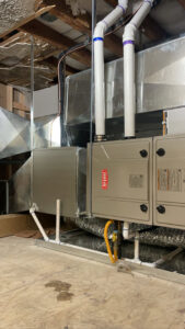 A Bryant furnace and air handler unit installation with connected ductwork by Big Leaf Mechanical LLC in South Salt Lake, UT.