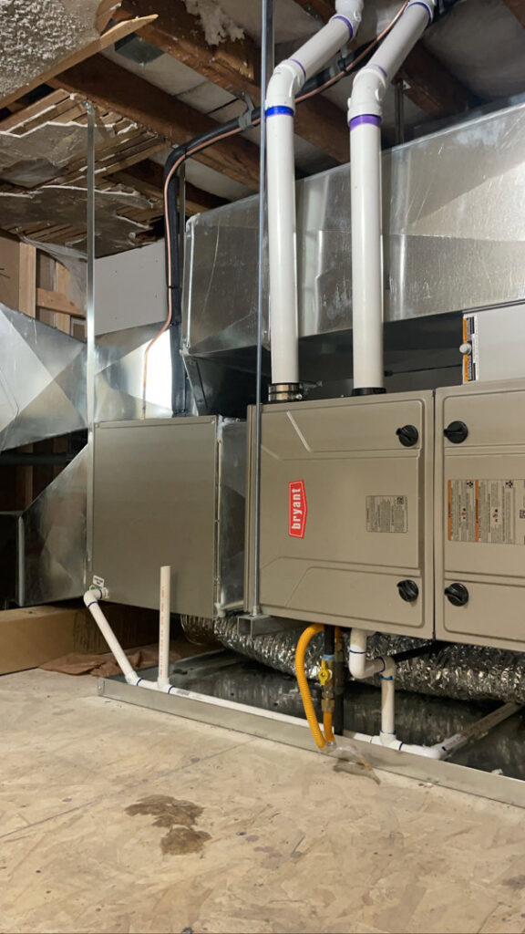A Bryant furnace and air handler unit installation with connected ductwork by Big Leaf Mechanical LLC in South Salt Lake, UT.