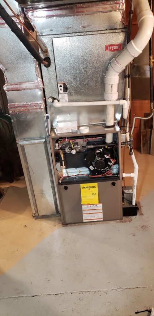 A Bryant furnace and air handler unit with exposed components, indicating repair or installation by Jv Services inc. in Pinellas Park, FL.