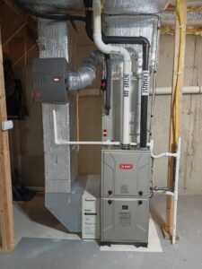 A newly installed Bryant furnace and HVAC system in a basement by C & C Temp Control in Worcester, MA.