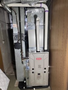 A Bryant furnace and air handler unit with ductwork installed by Comfort Temp HVAC LLC in Fort Smith, AR