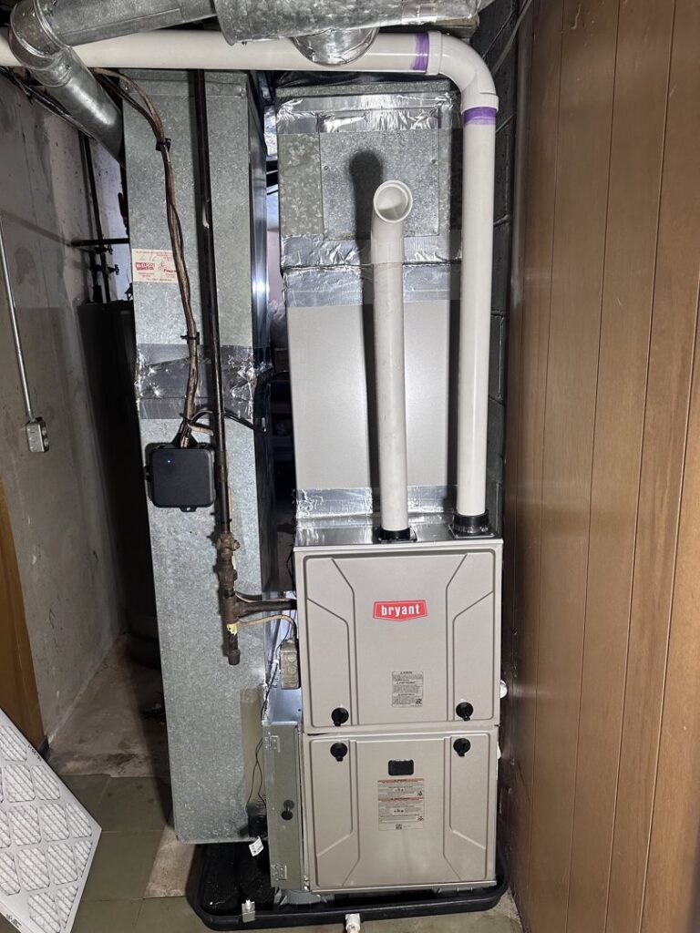 A Bryant furnace and air handler unit with ductwork installed by Comfort Temp HVAC LLC in Fort Smith, AR