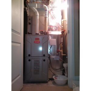 A Bryant HVAC furnace unit installed in a utility closet by Dan Deckard Hvac in Charlotte, NC