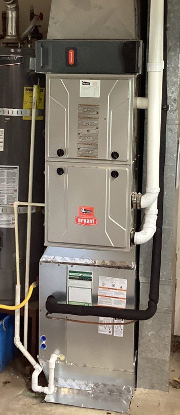A close-up of a Bryant indoor furnace and air handler unit installed by Gagles Heating in Salem, OR.