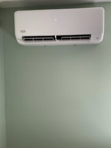 A Bryant mini-split HVAC unit installed on a wall by HomeWorks Energy in Charlestown, MA.