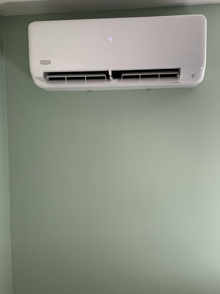 A Bryant mini-split HVAC unit installed on a wall by HomeWorks Energy in Charlestown, MA.