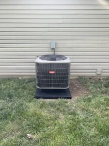 A Bryant outdoor air conditioning unit installed next to a home by 4-BIS Solutions HVAC and Home Maintenance in Columbia, MO.