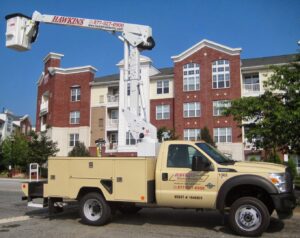 A Hawkins Electric Service, Inc. bucket truck ready for commercial electrical service in Laurel, MD.