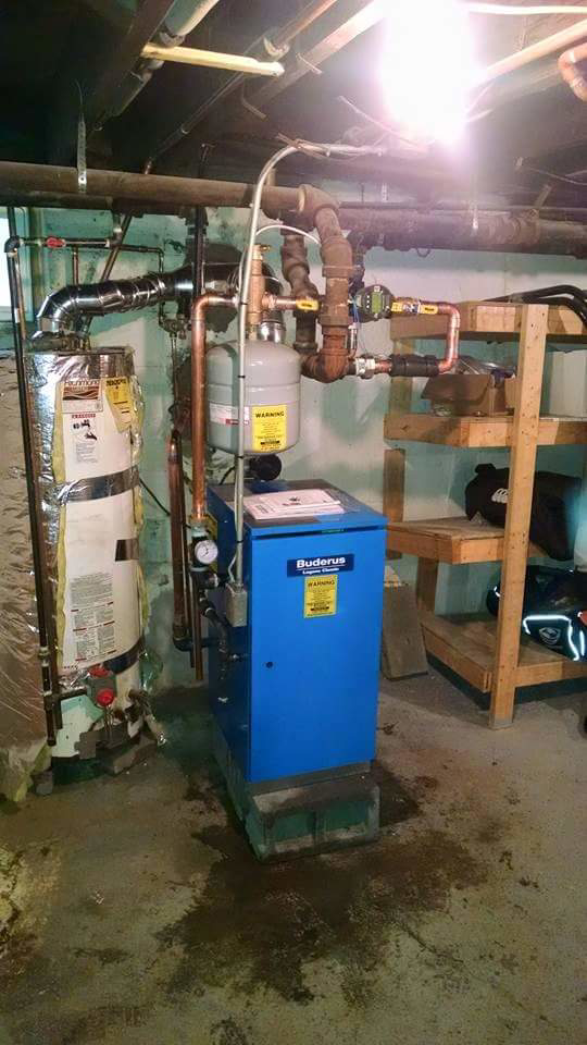 A Buderus boiler and water heater system installed by Rowan Heating and Air Conditioning, Inc. in Highland, MD
