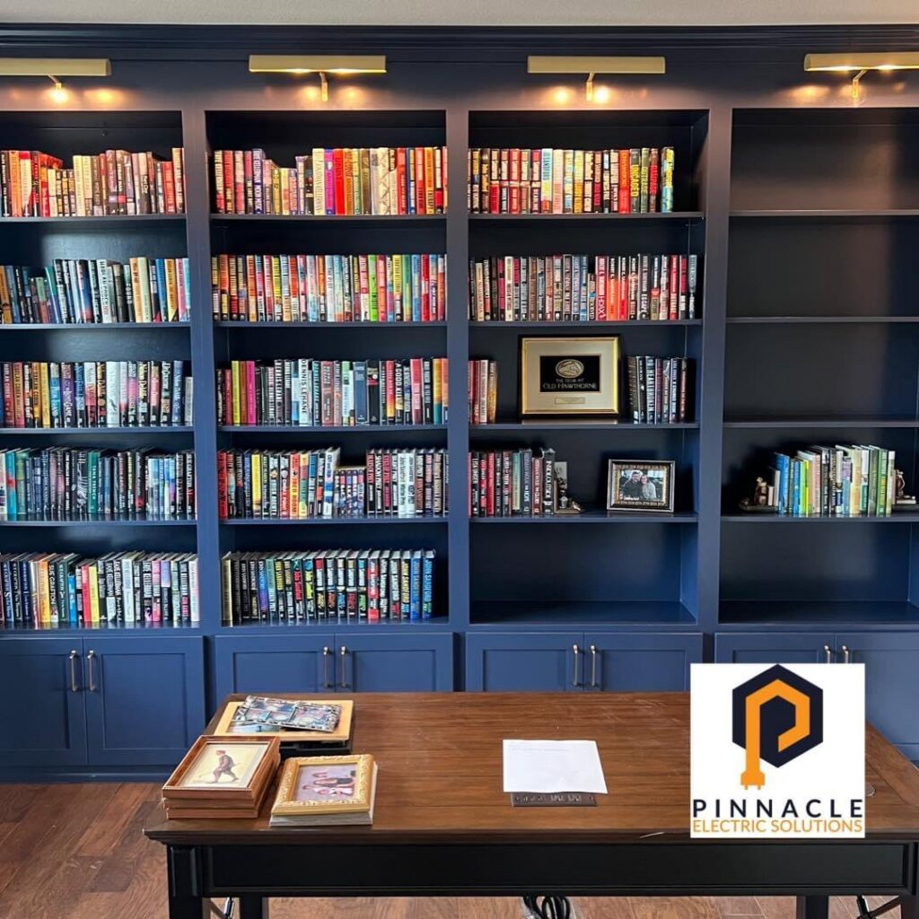 Built-in bookshelf lighting installation by Pinnacle Electric Solutions in Port St. Lucie, FL.