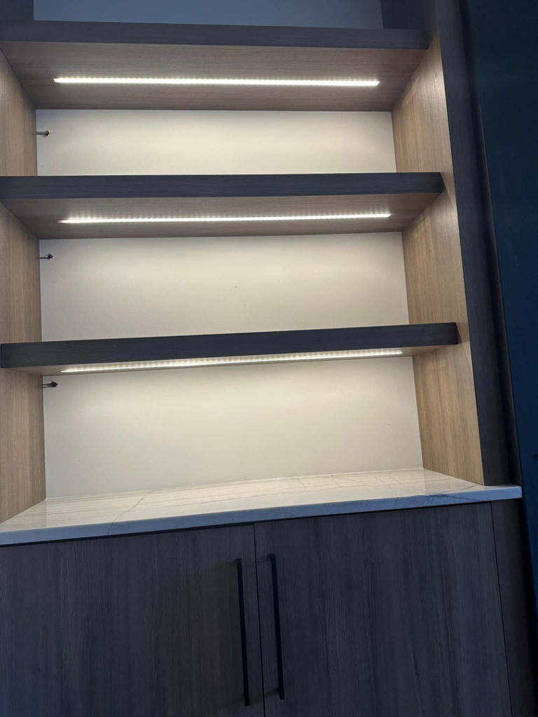 Built-in shelves featuring integrated LED strip lighting installed by Nech Electric Services Inc. in Chicago, IL.