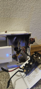 A close-up of a burnt and damaged electrical component, indicating an electrical fault, addressed by 715 Electric LLC in Eau Claire, WI.