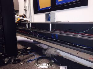 Cabling installation in progress with various wires and cables in a trench at D & D Cabling Solutions in Arlington, TX.